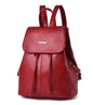 Red backpack with a brand logo on a white background