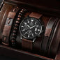 Black wristwatch with brown leather strap and beads in a wooden box