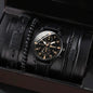 Black watch with detailed face and bracelet in a black box