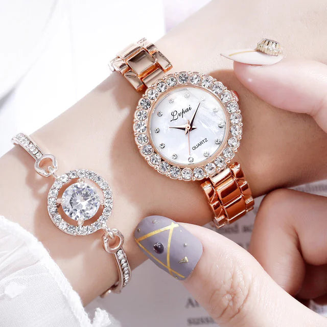 Rose gold watch with diamond accents on a wrist, with a close-up of the watch face.