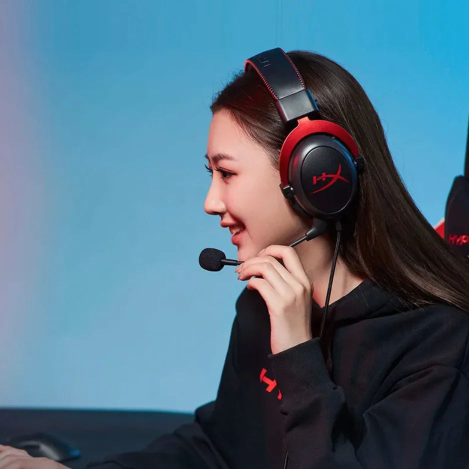 Person wearing a gaming headset with a blurred background